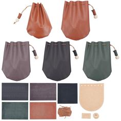 four different colors of leather pouchs with handles and zippers on each one side