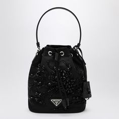 Black Re-Nylon Mini Bag From Prada Featuring Tone-On-Tone Beaded Embroidery, Soft Bucket Design, Enamelled Metal Logo Triangle On Front, Leather Handle, Adjustable And Removable Leather Shoulder Strap, Metal Hardware And Drawstring Closure. Width 19,5 Cm X Height 25 Cm X Depth 14 Cm Adjustable Shoulder Strap Length Min 75 Cm - Max 85 Cm Handle Drop: 13 Cm Size Type: Int Material: Cotton Sku: 2f-1be067wrm2c4q/P_prada-F0002_100 Welcome To The Official Luosophy Poshmark Closet! Luosophy Is A Luxury Prada Bucket Bag, Prada Mini, Prada Women, Prada Crossbody, Leather Bucket Bag, Leather Bucket, Prada Crossbody Bag, Black Nylons, Leather Cover