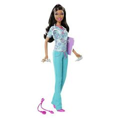 a barbie doll with long hair and blue pants, holding a book in her hand