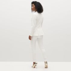 Women's White Tuxedo | SuitShop Elegant Pantsuit With Pressed Crease, Luxury Notch Lapel Wedding Pantsuit, Luxury Notch Lapel Pantsuit For Wedding, Elegant Long Sleeve Pantsuit With Pressed Crease, Elegant Long-sleeved Pantsuit With Pressed Crease, Chic Tailored Tuxedo With Lapel Collar, Elegant Tailored Blazer For Wedding, Elegant Pantsuit With Lapel Collar And Pressed Crease, Elegant Fitted Formal Pantsuit