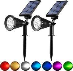 two solar powered lights on top of each other