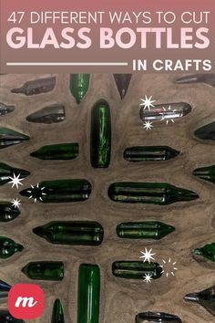 several green glass bottles sitting in a box with the words, 47 different ways to cut glass bottles in crafts