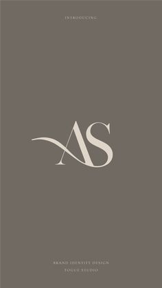 the as logo is shown on a gray background with white letters and an elegant design