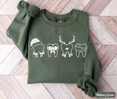 Cute Christmas Teeth Dental Sweatshirt, Dental Hygiene Team Merry Christmas Shirts, Holiday Tooth Dentist Sweater, Winter Dental Office Christmas Shirt, Christmas Dentist Teeth Shirt, Christmas Gift for Dentistry School Student ✧ SIZING ✧ ⋒ Please check our size chart before placing an order. ⋒ If you want an oversized look, pick a sweatshirt that is 2 sizes larger than your usual size. ✧ IMPORTANT NOTE: We try to depict all shirt and design colors as close to the original as possible but depend Christmas Dental Shirt, Christmas Teeth Dental, Dental T Shirts, Dental Christmas Shirt, Dental Gifts Ideas, Dental Christmas Shirts, Dental Sweatshirts, Dental Hygiene Shirt, Dentist Christmas