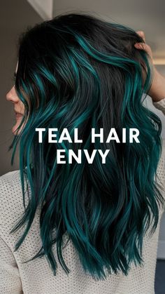 Ready to turn heads? Learn how to rock teal highlights! #tealhair #blackhair #boldhaircolor #hairinspo Teal Underneath Hair Blonde, Teal Hair Tips Dip Dyed, Teal Green Highlights, Dark Hair With Coloured Highlights, Brown To Teal Ombre Hair, Hair Color Ideas Fair Skin Blue Eyes, Shaggy Colored Hair, Blue Green Highlights In Brown Hair, Black Hair With Teal Underneath