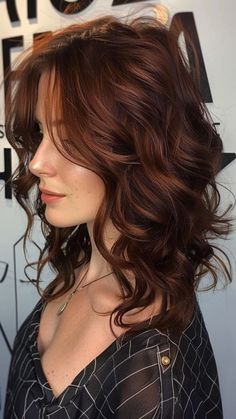 "These fall hair colors will help you embrace the beauty of the season with style." Dark Brown Hair To Auburn, Hair Color Deep Autumn, Soft Red Highlights In Brown Hair, Red Hair For Deep Autumn, Auburn Highlights Brown Hair, Auburn Highlights On Brown Hair, Deep Autumn Color Palette Hair, Dark Autumn Hair Color Ideas, Dark Auburn Hair With Highlights