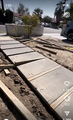 some wooden planks laying on the ground