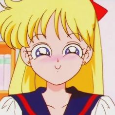 an anime character with blonde hair and blue eyes