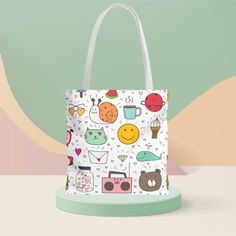 Product Description: Unleash your playful side with our Whimsical Doodles Tote Bag, featuring a delightful mix of random items such as smile emojis, whales, radios, ice cream, mail letters, snails, pakwan, hamburgers, diamond gems, pineapples, and bears. Made with 100% polyester, this medium-weight fabric bag (6.49 oz/yd², 200 g/m²) is designed to be both strong and durable, making it perfect for everyday use. This tote bag comes with a non-woven laminate interior and comfortable cotton webbing Whimsical Doodles, Soft Bristle Brush, Mail Letters, Fabric Bag, Playful Design, Radios, Smiley, Doodles, Accessory Gift