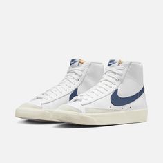 Style No. CZ1055-125 Color: White/Sail/Diffused Blue Styled for the ‘70s. Loved in the ‘80s. Classic in the ‘90s. Ready for the future. The Nike Blazer Mid ’77 delivers a timeless design that’s easy to wear. Its unbelievably crisp leather upper breaks in beautifully and pairs with bold retro branding and luscious suede accents for a premium feel. Exposed foam on the tongue and a special midsole finish this off in style. Nike Blazer Mid '77 Women's Shoes. Nike Blazer Sail, Nike Blazer Mid 77 Basketball, Nike Blazer Mid 77 Black White Black, Nike Blazer Mid Beige, Nike Blazers Fig 2, Nike Blazers 77 Vintage, Nike Blazers For Boys, Womens Nike Blazer Mid 77, Womens Nike Mid Blazer