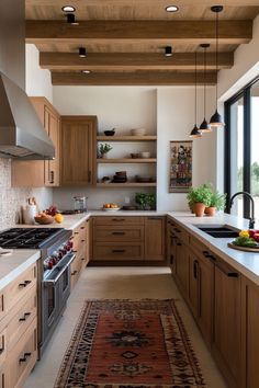 a kitchen with wooden cabinets and an area rug