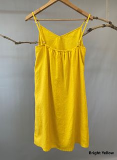 "Nothing welcomes the hot weather more than linen. This simple linen slip dress is a must have and can be more playful if layered. -100% linen construction -V neck -Slightly A-line shaped -Adjustable spaghetti straps -Above the knee -Slip on overhead -Listing colors: Blush, Natural, and White Please provide your shoulder width, full bust measurement ( measured around the fullest part) and your height along with your order in the note to seller box. Don't see your size? Please message us for cust Sundress Mini, Linen Cami, Linen Camisole, Dress Above The Knee, Linen Slip Dress, Mini Summer Dress, Simple Linen, Navy Shirt Dress, Linen Sundress