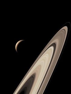 saturn and its rings in the dark sky, taken from nasa's cassnix