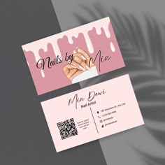 two business cards designed to look like they are holding hands with the words nails by mia on them