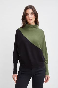 The asymmetric color blocking & mock neck add to the architectural appeal of this relaxed fit sweater. Designed with dolman sleeves & a rib stitch, we love the look and feel of this ultra-soft butter yarn sweater.     T-Tahari Mock Neck Rib Asymmetric Colorblock Sweater    52% Viscose, 28% Polyester, 20% Nylon    Runs true to Size    Model is 5'9" and wearing size S    Dry Clean Only    Imported    Style #: THF49014 Autumn Green, Yarn Sweater, Colorblock Sweater, Rib Stitch, Dolman Sleeve Sweater, Jumpsuit Jacket, Long Sleeve Short Dress, Color Block Sweater, Knit Tees