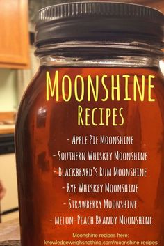 a jar of moonshine recipe sitting on top of a table