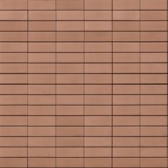 a brown brick wall with small squares on the bottom and one square at the top