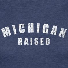 michigan raised t - shirt in navy blue with white letters on the chest and back