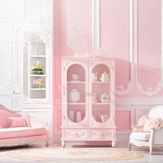 a living room with pink walls and white furniture in it's centerpieces