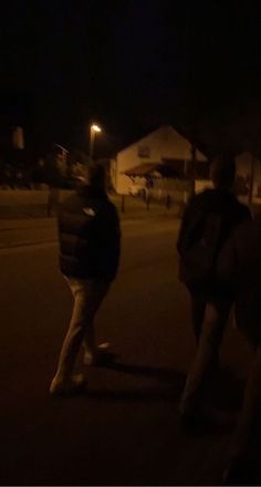 There are two blond boys with black north face jackets and bright jeans on walking down the street. In the background are houses and street lights wich are giving the photo a good light. The photo is showing a night walk and has a vibey night aesthetic. Fake Snp Night, Walking At Night Snap, Outside Snaps Night, Friends Walking At Night, Night Walks With Boyfriend, Fake Night Out Snaps, Walk Aesthetic Night, Fake Snaps Night Friends, Boys Night Out Aesthetic