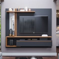 a living room with a large television on the wall