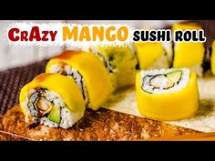 some sushi rolls are on a cutting board with the words crazy mango in front of it