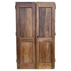 an old wooden double door on a white background