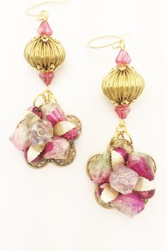 "A lovely set of earrings that reflect a retro / vintage time.  These are made from a vintage pair of clip on earrings and embellished with vintage components.    These have an elegant and classy look and feel.  These will arrive beautifully packaged and ready for gift giving if desired.  Measurements:  Length, not including ear wire is 2-3/4\" long Width - 1\" at widest point" Vintage Metal Earrings For Festive Occasion, Vintage Dangle Chandelier Earrings For Festive Occasions, Vintage Chandelier Dangle Earrings For Festive Occasions, Vintage Festive Dangle Chandelier Earrings, Vintage Metal Chandelier Earrings For Festive Occasions, Vintage Pink Flower Earrings For Party, Festive Vintage Brass Earrings, Vintage Festive Metal Chandelier Earrings, Vintage Brass Clip-on Earrings For Gift