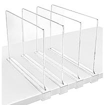 three clear acrylic displays on a white background