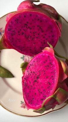 two pieces of dragon fruit on a plate