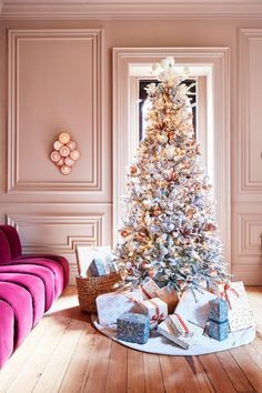 a decorated christmas tree in a living room