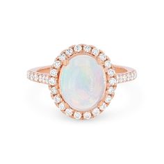 a white opal and diamond ring with an oval halo setting in rose gold plated sterling