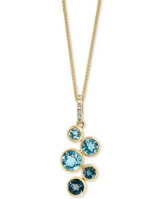 Stunning London Blue Topaz stones is fall gracefully in an ombre-inspired design in this striking pendant necklace from Lali Jewels. London Blue Topaz Necklace, Jewelry Necklace Simple, Blue Topaz Pendant Necklace, Diamond Pendant Jewelry, Diamond Pendants Designs, Jewerly Designs, Unique Pendant Necklace, Blue Topaz Necklace, Opal Pendant Necklace