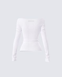 Sleek, chic, and effortless - this top is the perfect closet essential ✨ Constructed from soft stretch textured jersey, and complete with extra long sleeves and a raw edge for a sleek and subtle staple piece that's perfect for all occasions 🤍 Chic Long Sleeve Tops With Ribbed Neckline, Chic Solid Stretch Knit Top, Chic Stretch Solid Color Knit Top, Chic Ribbed Fitted Top, Chic Long Sleeve Stretch Fine Knit Top, Chic Stretch Long Sleeve Top In Fine Knit, Chic Long Sleeve Ribbed Top, Chic Ribbed Long Sleeve Tops, Chic Ribbed Long Sleeve Top With Stretch