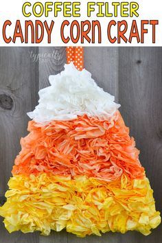 coffee filter candy corn craft with the title overlay that reads, coffee filter candy corn craft