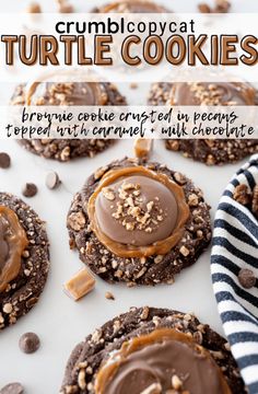 some cookies with chocolate frosting and nuts on top