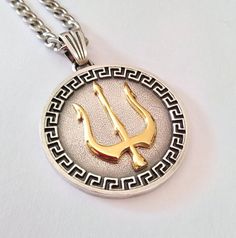 ★ Trident Pendant ★  A beautiful handcrafted Trident pendant/necklace for Men and Women. * Materials/Finishes ➤ Artificially Aged Silver 925 ➤ 24K Gold Plated - over Artificially Aged Silver 925 - only of the Trident Symbol * Dimensions ➤ 3.7 x 3.4 x 0.3 cm (~ 1.5 x 1.3 x 0.1 inches)/Bail: Suitable for up to 3.0 mm (~ 0.1 inches) Chain * Weight: ~ 17 grams (in Silver 925) ----------------------------------------------------------------------------- IMPORTANT NOTES: ------------------------------ Poseidons Trident, Percy Jackson Jewelry, Trident Symbol, Trident Pendant, Trident Necklace, Greek Meander, Small Girly Tattoos, Rustic Bathroom Designs, Greek Jewelry