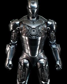 an iron man standing in front of a black background with the words omg written on it