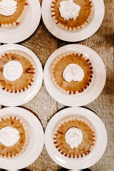 six pies with white frosting on them are arranged in the shape of circles