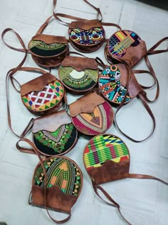 This is a set of complete 10 tote leather bags. They are totally made of fabric and leather and comes in different colours, size and designs.Place your orders for this amazing deal as for both retail and wholesale Oromo Jewelry, Kitenge Bags, African Print Bags, Fancy Handbags, Ankara Bags, African Bag, African Crafts, African Accessories, Diy Leather Bag