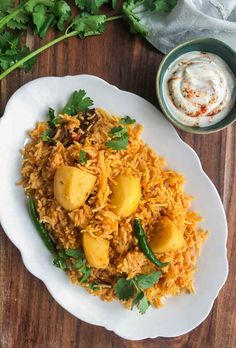 aloo thaari or spiced potato rice on a white plate