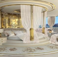 a large bed sitting inside of a bedroom on top of a white and gold floor