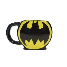 a black and yellow batman coffee mug on a white background