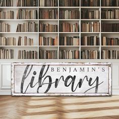 a library with bookshelves and a sign that reads, benjamin's library