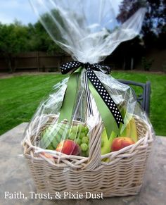 a basket filled with fruit sitting on top of a table