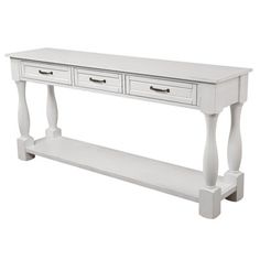 a white console table with two drawers