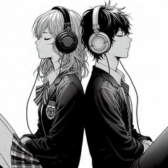 two people sitting next to each other with headphones on