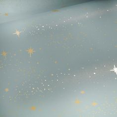 gold and white stars on a light blue background