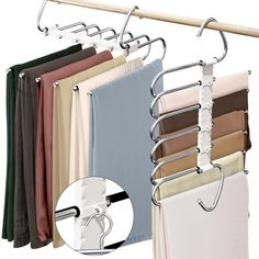 an over the door towel rack with six folded towels hanging on it's side