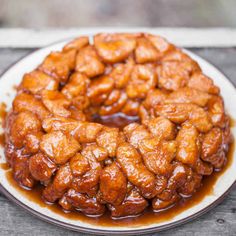 this is an image of a bundt cake with caramel sauce on it and then covered in cinnamon